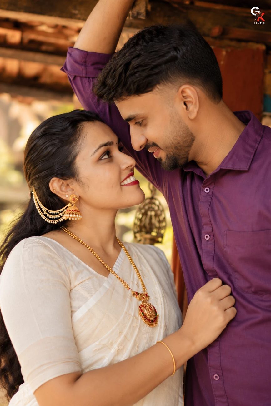 Manisha and Pawan gazing at each other, Pawan in a purple shirt